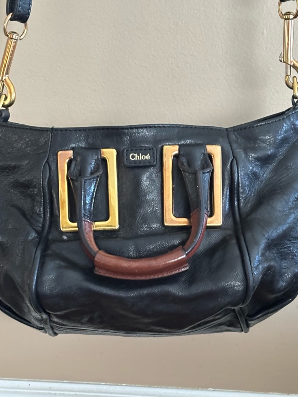 Black Leather Shoulder Bag with Brown Handle